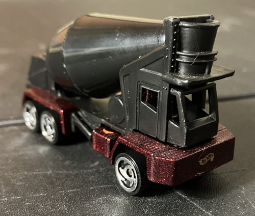 Black oshkosh cement truck - black,